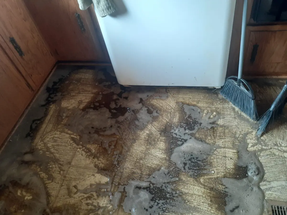 Kitchen floor in a Santa Ana home before cleaning