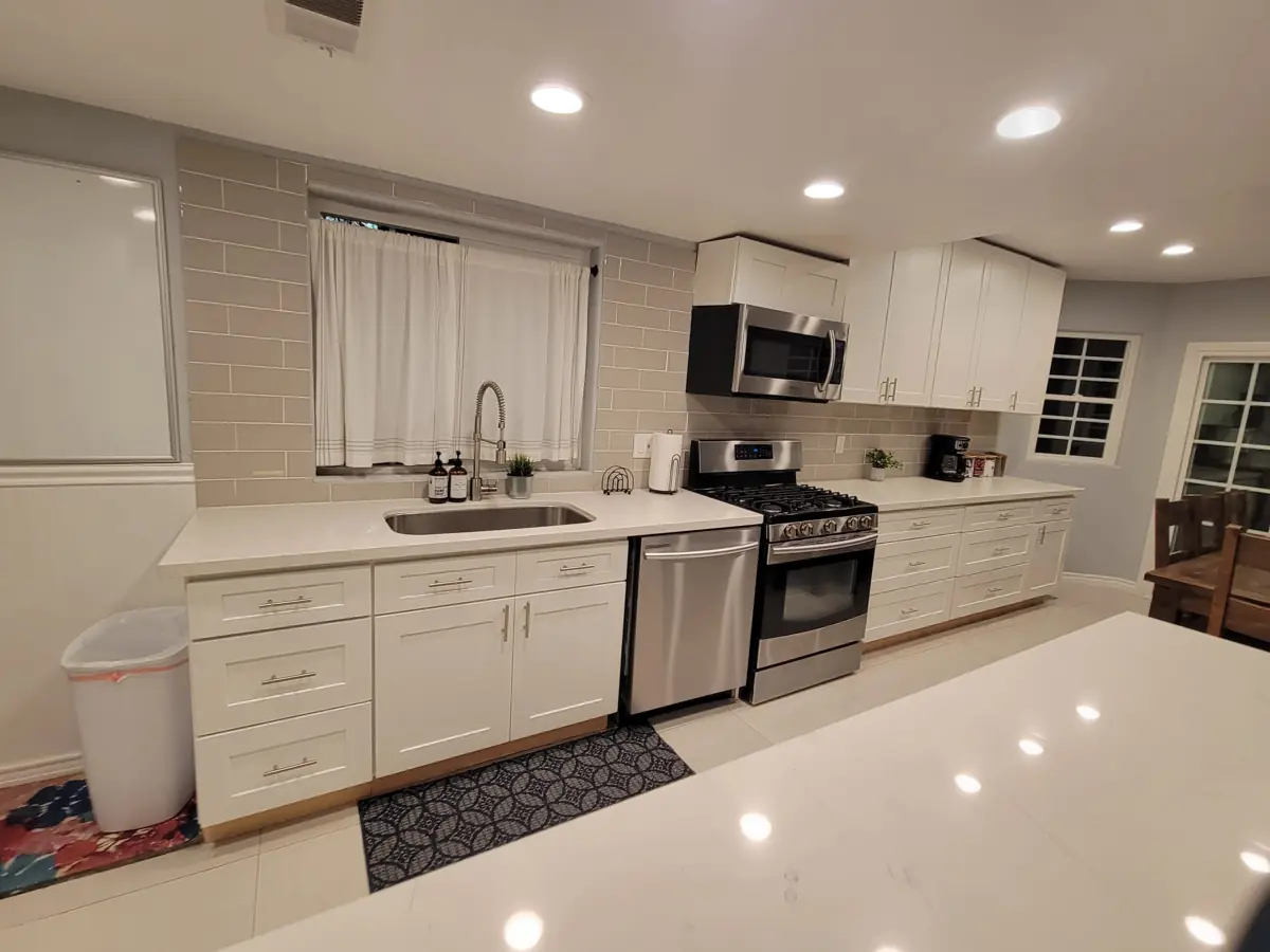 Kitchen counters, sink and range after cleaning