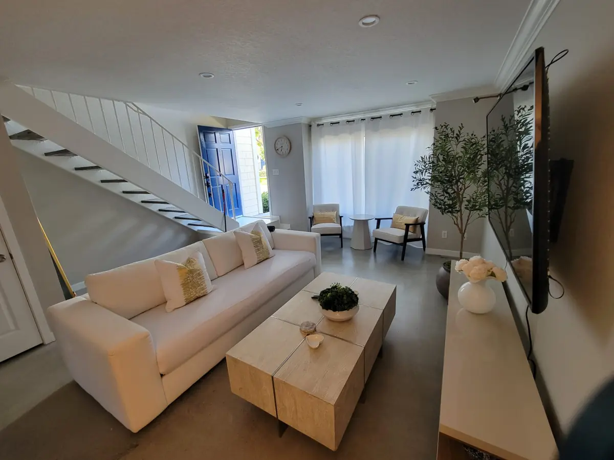 Living room with sofa and coffee table after cleaning in Santa Ana